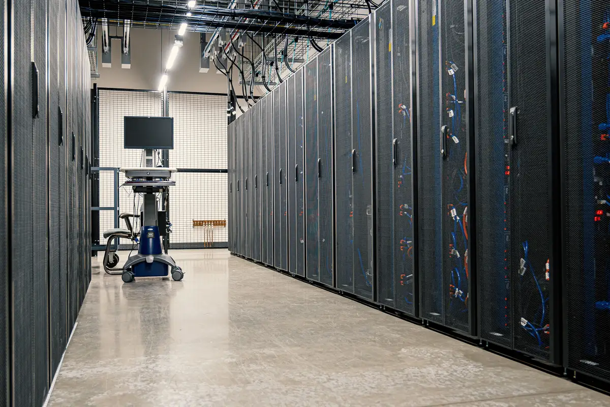 A data centre aisle, racks on both sides
